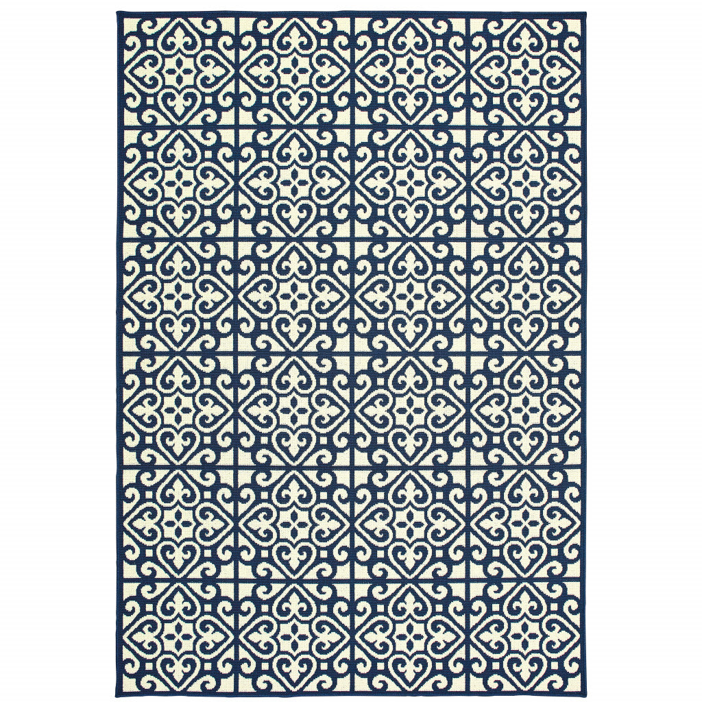 2' X 4' Ivory and Blue Geometric Stain Resistant Indoor Outdoor Area Rug