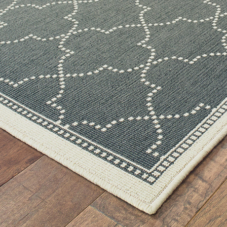 7' X 10' Gray and Ivory Geometric Stain Resistant Indoor Outdoor Area Rug