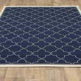 2' X 4' Blue and Ivory Geometric Stain Resistant Indoor Outdoor Area Rug