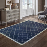 5' X 8' Blue and Ivory Geometric Stain Resistant Indoor Outdoor Area Rug