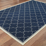 8' X 11' Blue and Ivory Geometric Stain Resistant Indoor Outdoor Area Rug