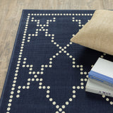 2' X 4' Blue and Ivory Geometric Stain Resistant Indoor Outdoor Area Rug