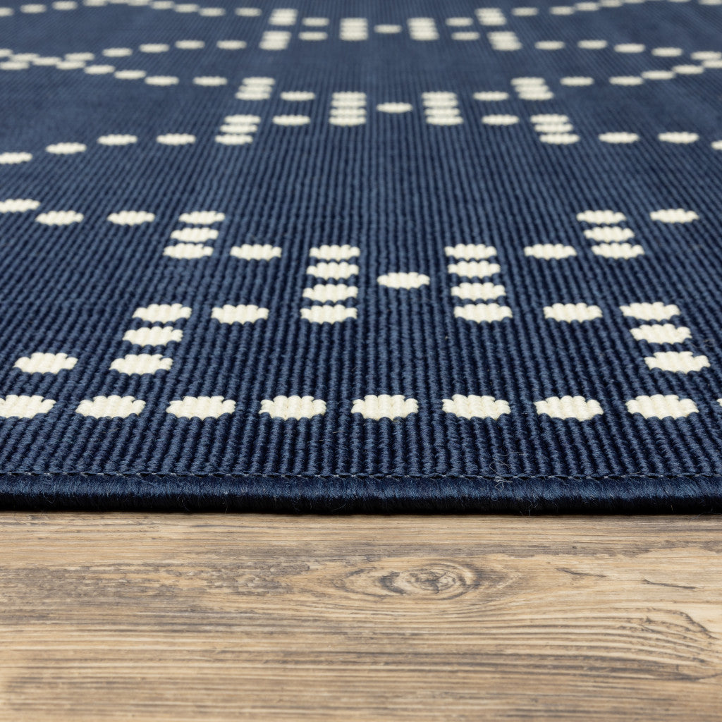 2' X 4' Blue and Ivory Geometric Stain Resistant Indoor Outdoor Area Rug