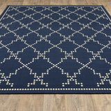 7' X 10' Blue and Ivory Geometric Stain Resistant Indoor Outdoor Area Rug