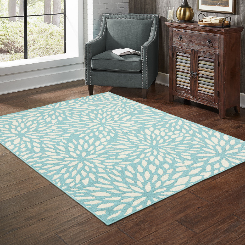 4' X 6' Blue and Ivory Floral Stain Resistant Indoor Outdoor Area Rug