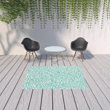 5' X 8' Blue and Ivory Floral Stain Resistant Indoor Outdoor Area Rug