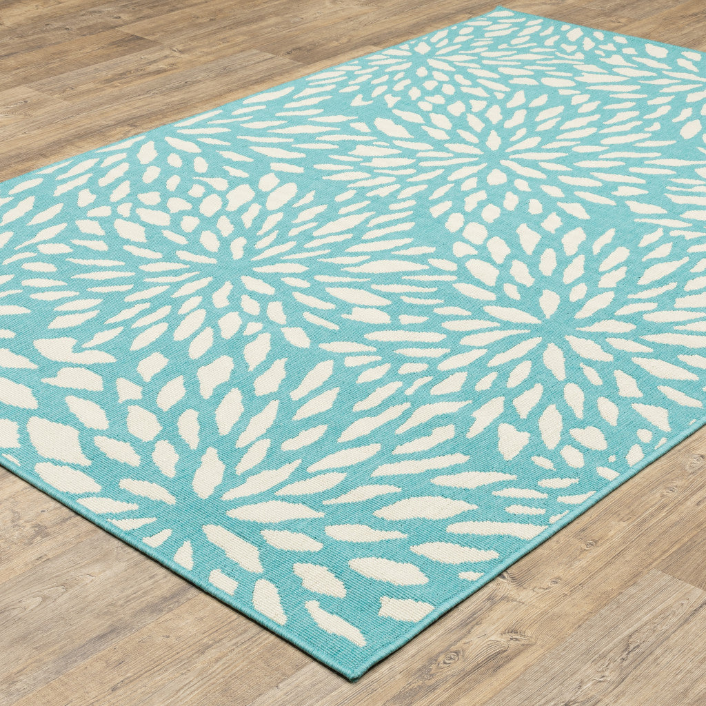 5' X 8' Blue and Ivory Floral Stain Resistant Indoor Outdoor Area Rug