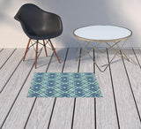 2' X 3' Blue and Ivory Geometric Stain Resistant Indoor Outdoor Area Rug