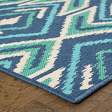 5' X 8' Blue and Ivory Geometric Stain Resistant Indoor Outdoor Area Rug