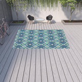 9' X 13' Blue and Ivory Geometric Stain Resistant Indoor Outdoor Area Rug