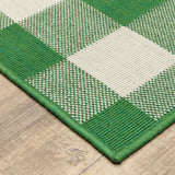 5' X 8' Green and Ivory Geometric Stain Resistant Indoor Outdoor Area Rug