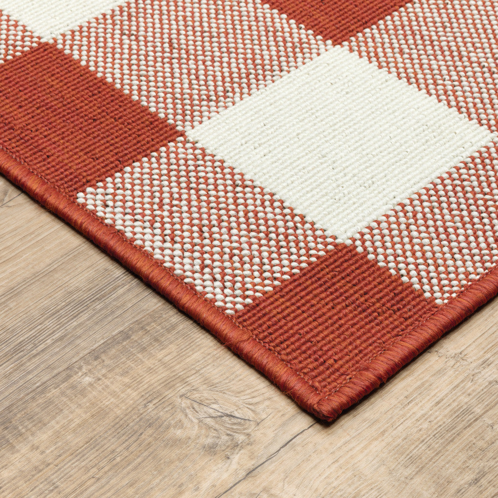 2' X 3' Red and Ivory Geometric Stain Resistant Indoor Outdoor Area Rug