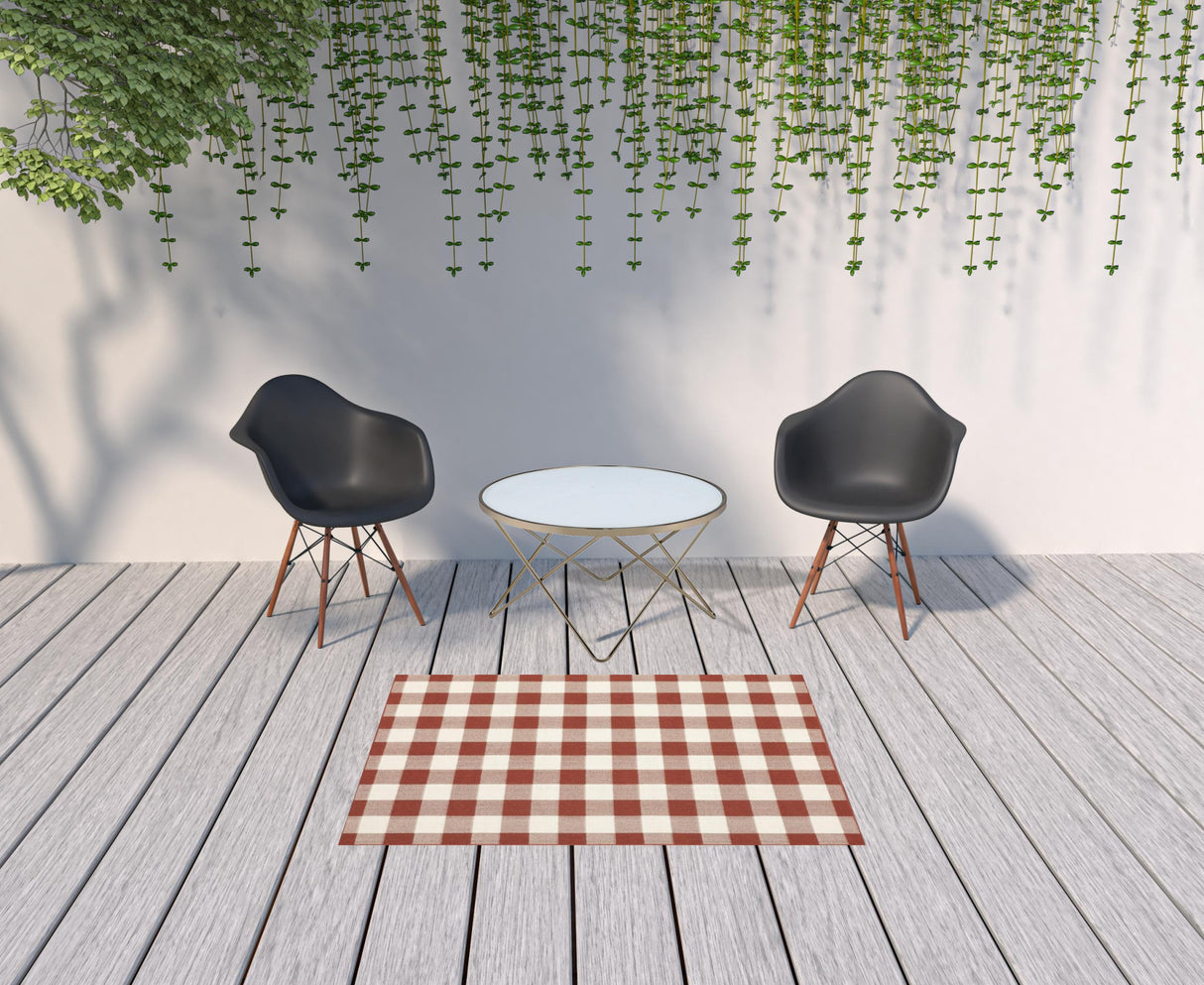 4' X 6' Red and Ivory Geometric Stain Resistant Indoor Outdoor Area Rug