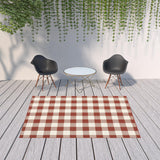 7' X 10' Red and Ivory Geometric Stain Resistant Indoor Outdoor Area Rug