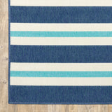 2' X 8' Blue and Ivory Geometric Stain Resistant Indoor Outdoor Area Rug