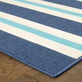 7' X 10' Blue and Ivory Geometric Stain Resistant Indoor Outdoor Area Rug