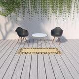 2' X 8' Brown and Ivory Abstract Stain Resistant Indoor Outdoor Area Rug