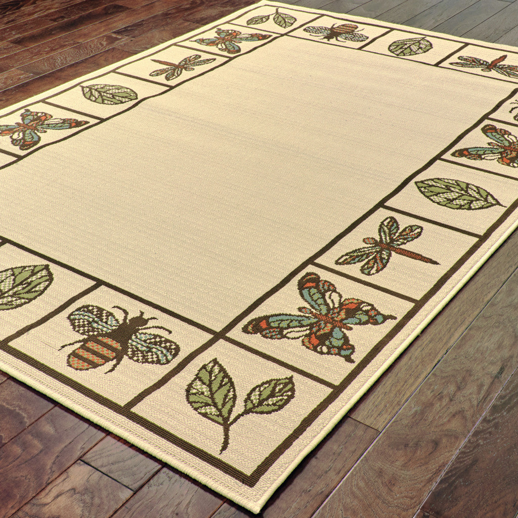 5' X 8' Brown and Ivory Abstract Stain Resistant Indoor Outdoor Area Rug