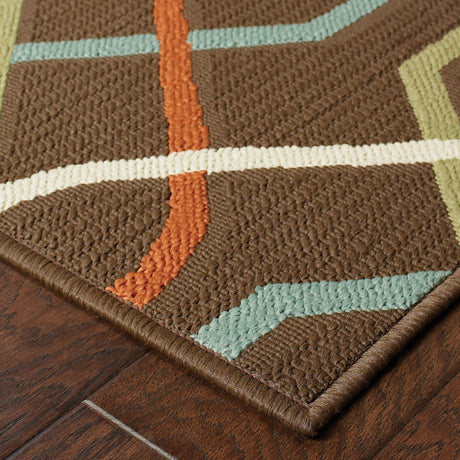 7' X 10' Brown and Ivory Geometric Stain Resistant Indoor Outdoor Area Rug