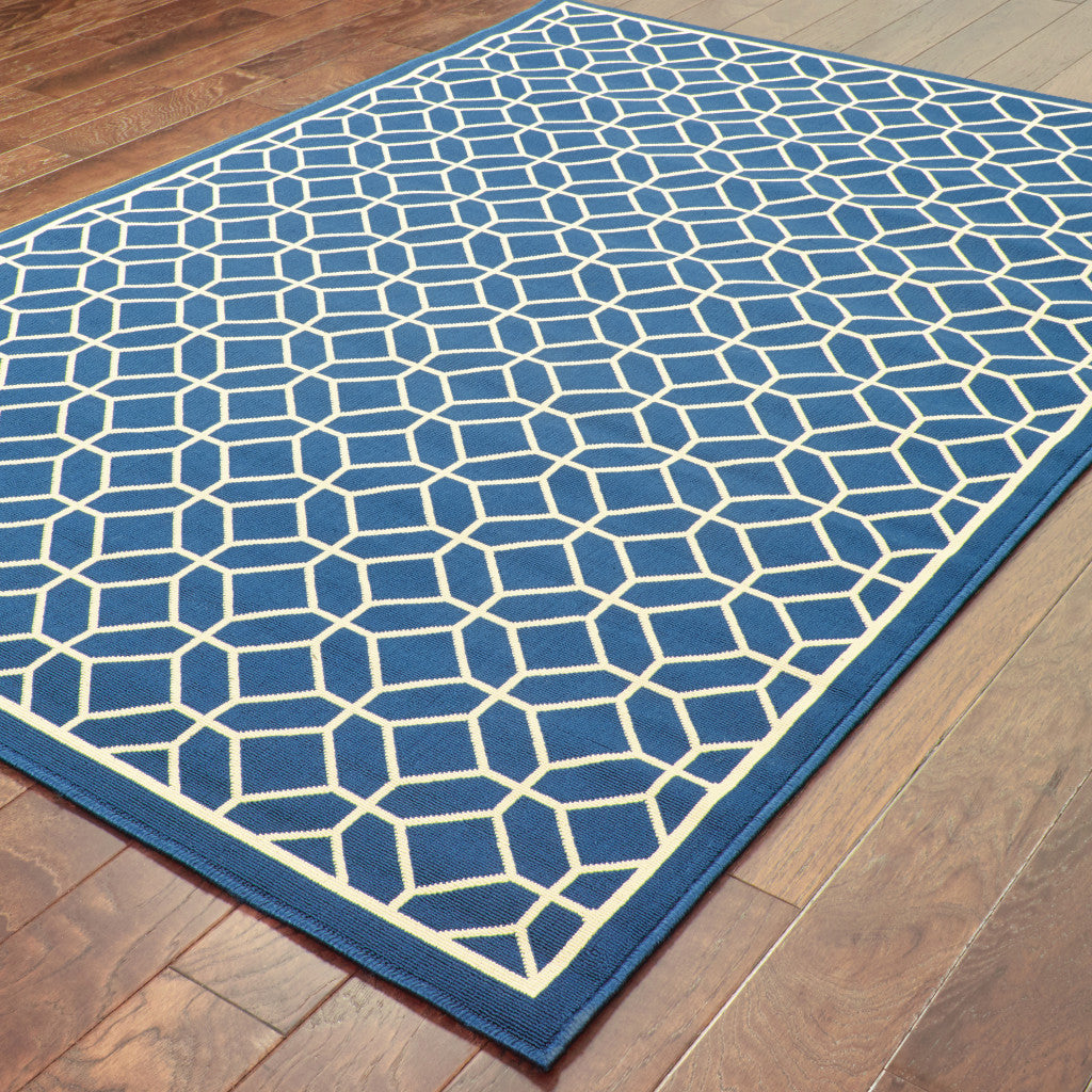 9' X 13' Blue and Ivory Geometric Stain Resistant Indoor Outdoor Area Rug