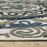 2' X 7' Blue and Beige Geometric Stain Resistant Indoor Outdoor Area Rug