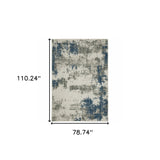 7' X 9' Blue and Beige Abstract Stain Resistant Indoor Outdoor Area Rug