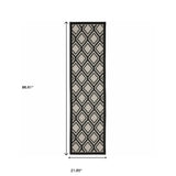 2' X 7' Beige and Black Geometric Stain Resistant Indoor Outdoor Area Rug