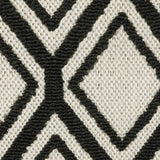 2' X 7' Beige and Black Geometric Stain Resistant Indoor Outdoor Area Rug