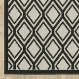 2' X 7' Beige and Black Geometric Stain Resistant Indoor Outdoor Area Rug