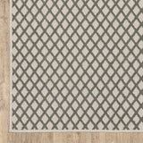 5' X 7' Beige Geometric Stain Resistant Indoor Outdoor Area Rug