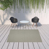 7' X 9' Beige Geometric Stain Resistant Indoor Outdoor Area Rug