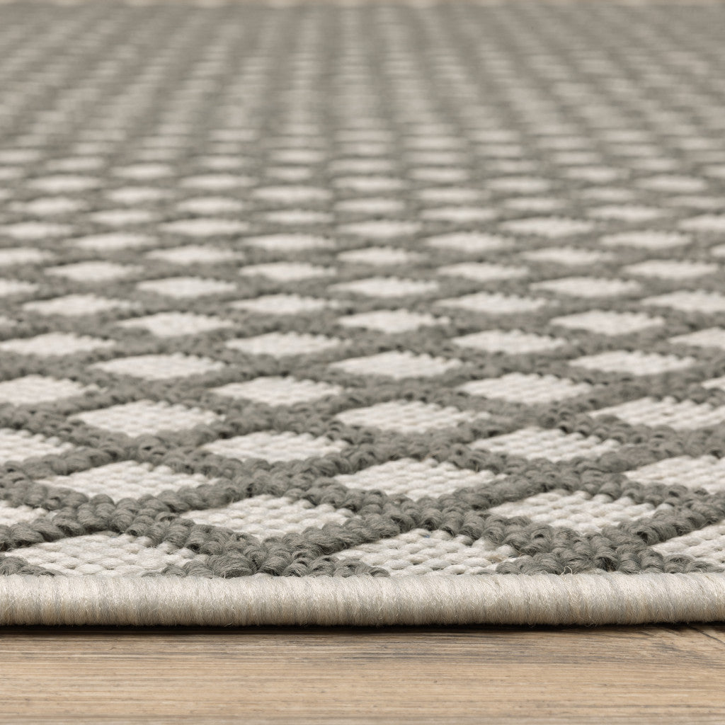 7' X 9' Beige Geometric Stain Resistant Indoor Outdoor Area Rug