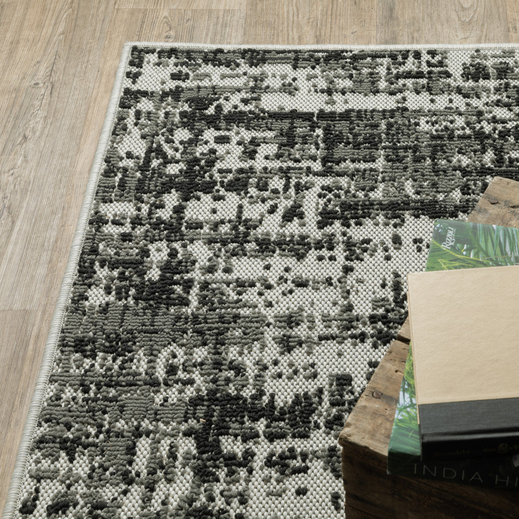 8' X 10' Beige and Black Abstract Stain Resistant Indoor Outdoor Area Rug