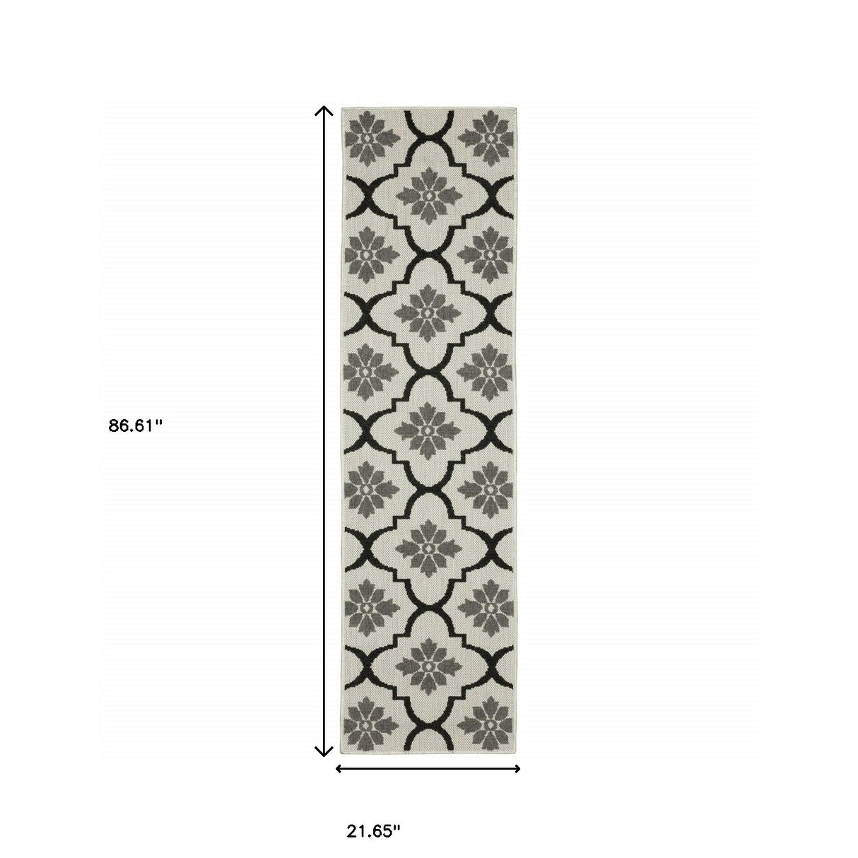 2' X 7' Beige and Black Geometric Stain Resistant Indoor Outdoor Area Rug