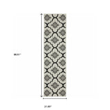 2' X 7' Beige and Black Geometric Stain Resistant Indoor Outdoor Area Rug