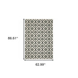 5' X 7' Beige and Black Geometric Stain Resistant Indoor Outdoor Area Rug