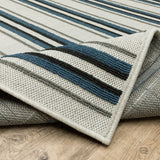 2' X 7' Blue and Beige Geometric Stain Resistant Indoor Outdoor Area Rug