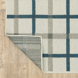 5' X 7' Blue and Beige Geometric Stain Resistant Indoor Outdoor Area Rug