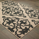 4' X 5' Beige and Black Oriental Stain Resistant Indoor Outdoor Area Rug