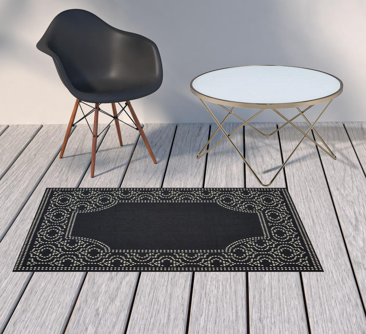 2' X 4' Black and Ivory Stain Resistant Indoor Outdoor Area Rug