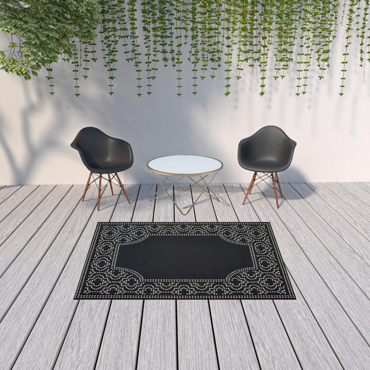 5' X 8' Black and Ivory Stain Resistant Indoor Outdoor Area Rug