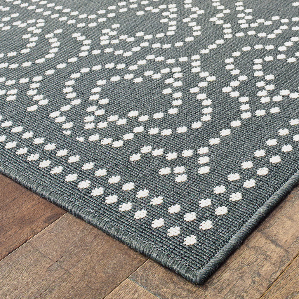 2' X 4' Gray and Ivory Stain Resistant Indoor Outdoor Area Rug