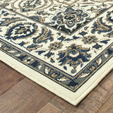 4' X 6' Ivory and Blue Oriental Stain Resistant Indoor Outdoor Area Rug