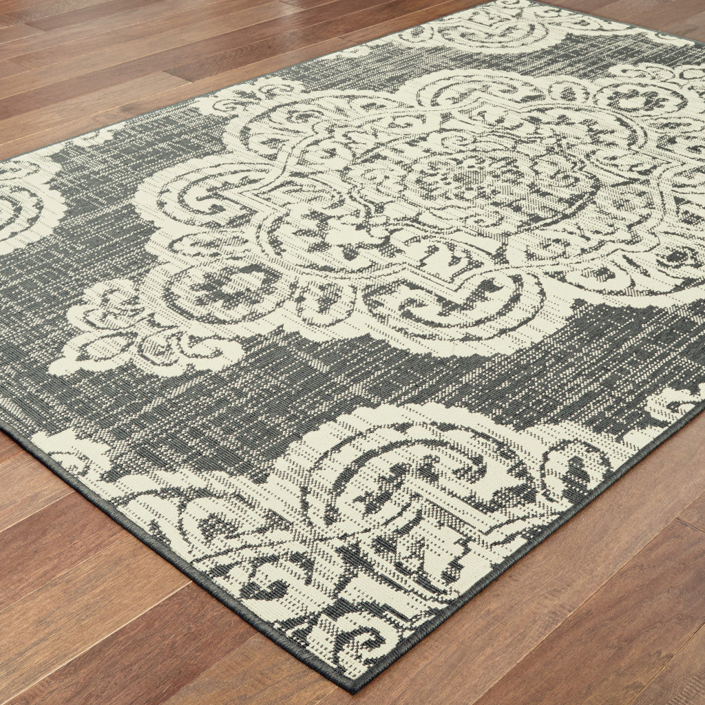 7' X 10' Gray and Ivory Oriental Stain Resistant Indoor Outdoor Area Rug