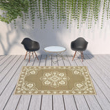 7' X 10' Tan Oriental Stain Resistant Indoor Outdoor Area Rug