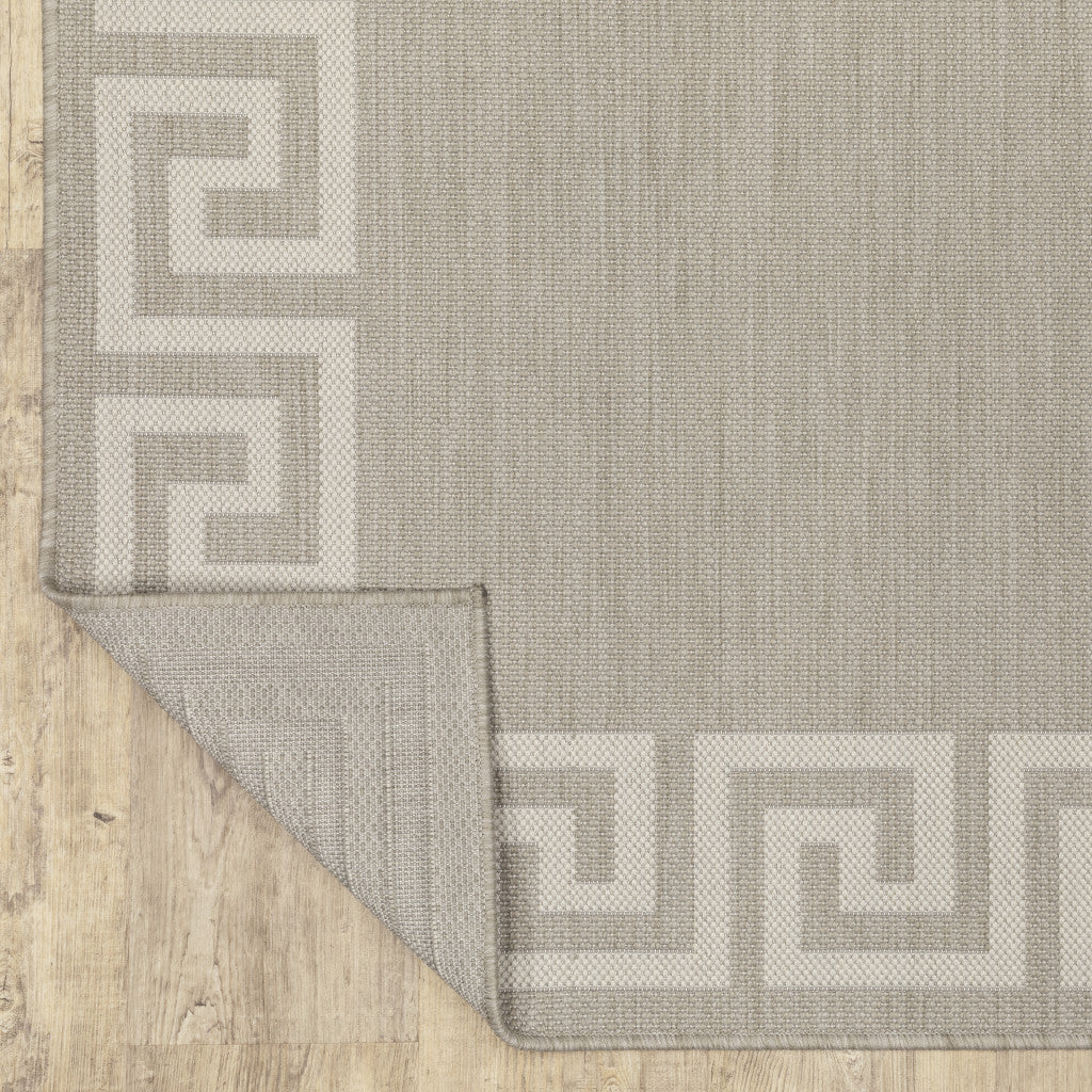 5' X 7' Gray and Ivory Stain Resistant Indoor Outdoor Area Rug