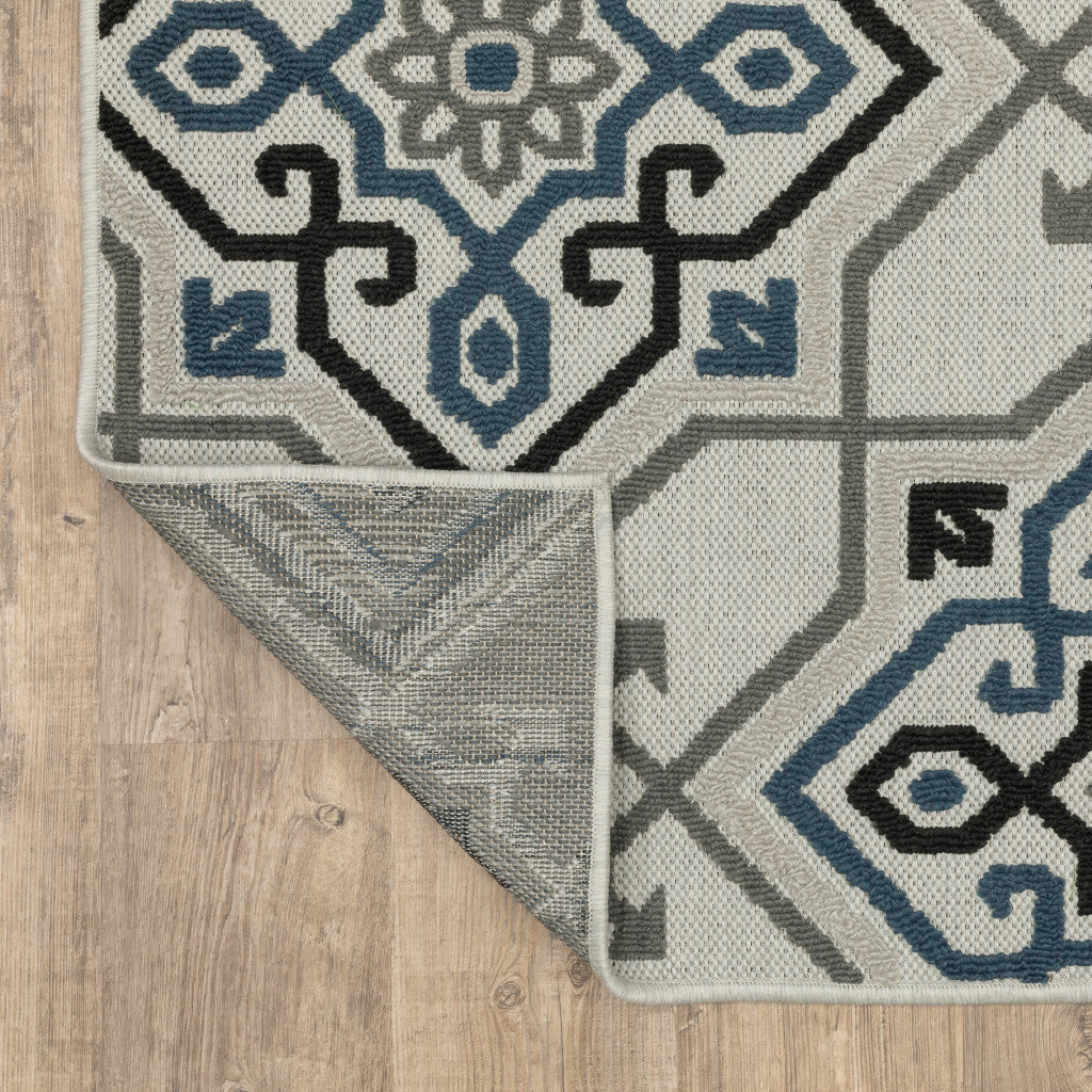 5' X 7' Blue and Beige Oriental Stain Resistant Indoor Outdoor Area Rug