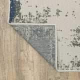 2' X 4' Blue and Beige Abstract Stain Resistant Indoor Outdoor Area Rug