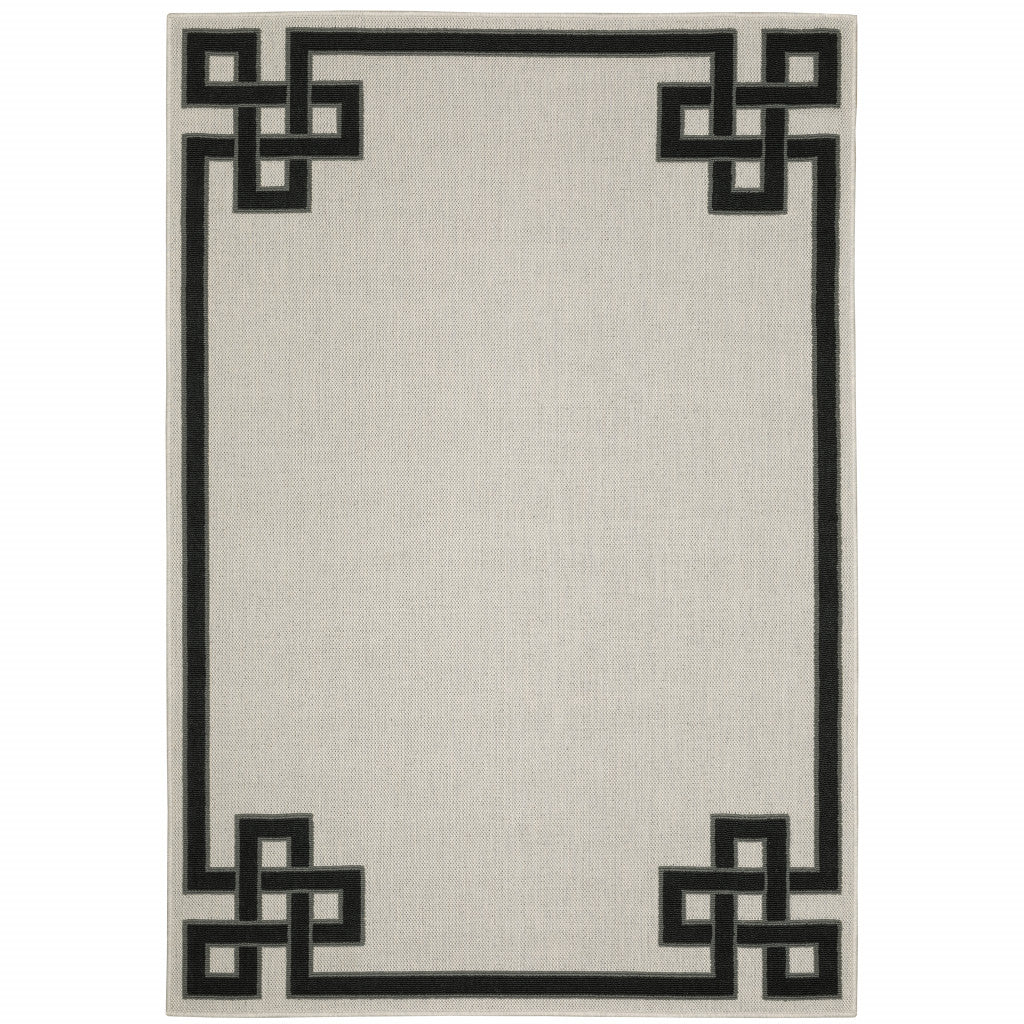 2' X 4' Beige and Black Stain Resistant Indoor Outdoor Area Rug