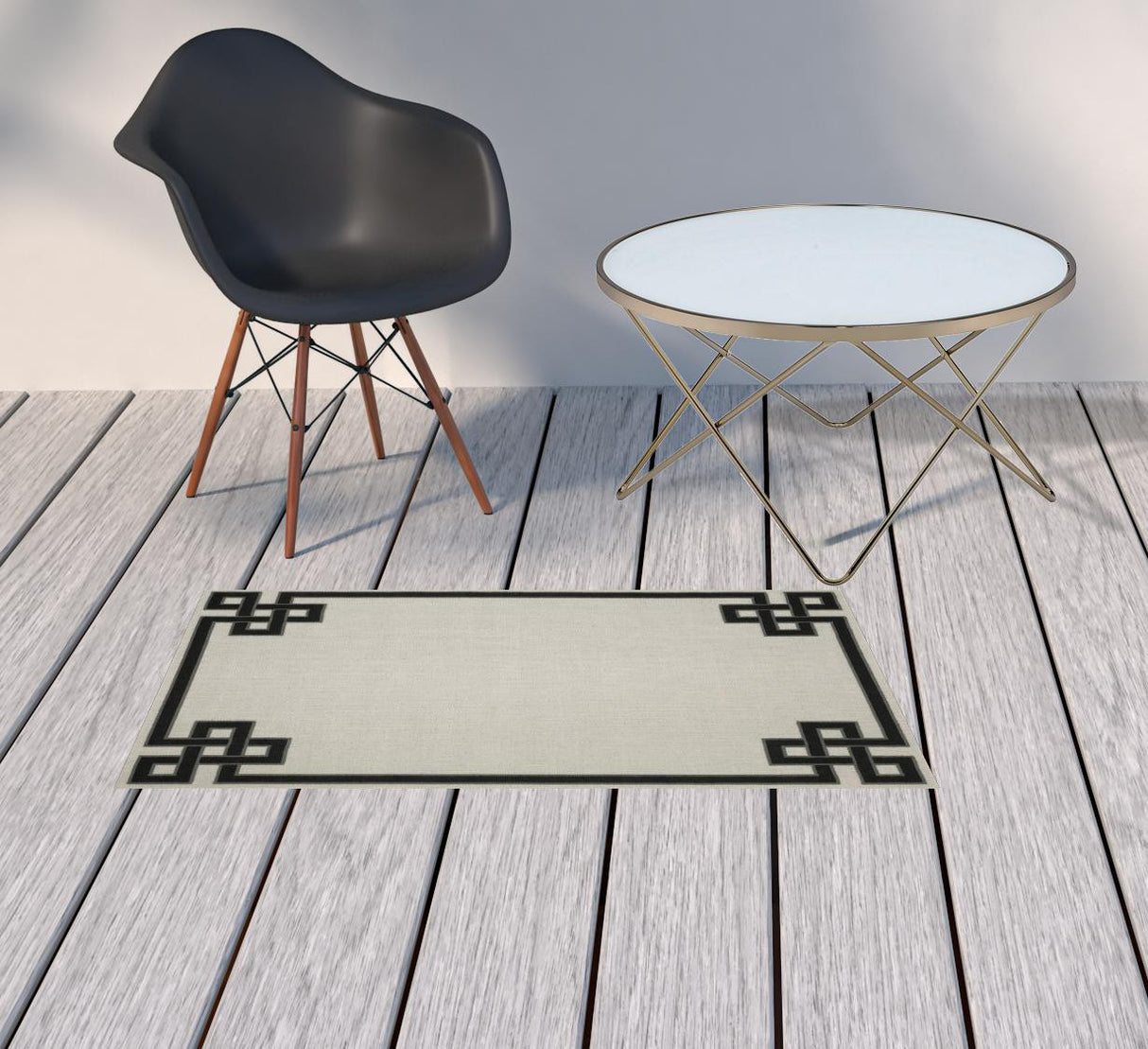 2' X 4' Beige and Black Stain Resistant Indoor Outdoor Area Rug